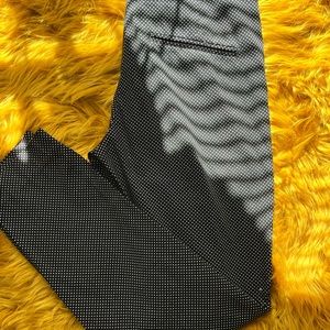 Polka dot, mid leg length dress pants. Fits nice around the waist.